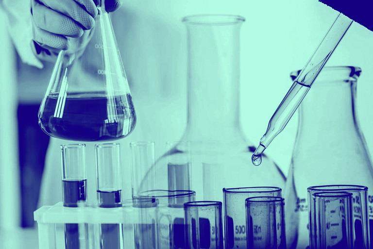 lab image with multiple beakers