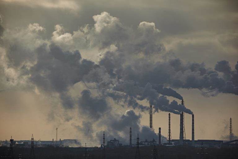 smoke clouds being emitted from a plant