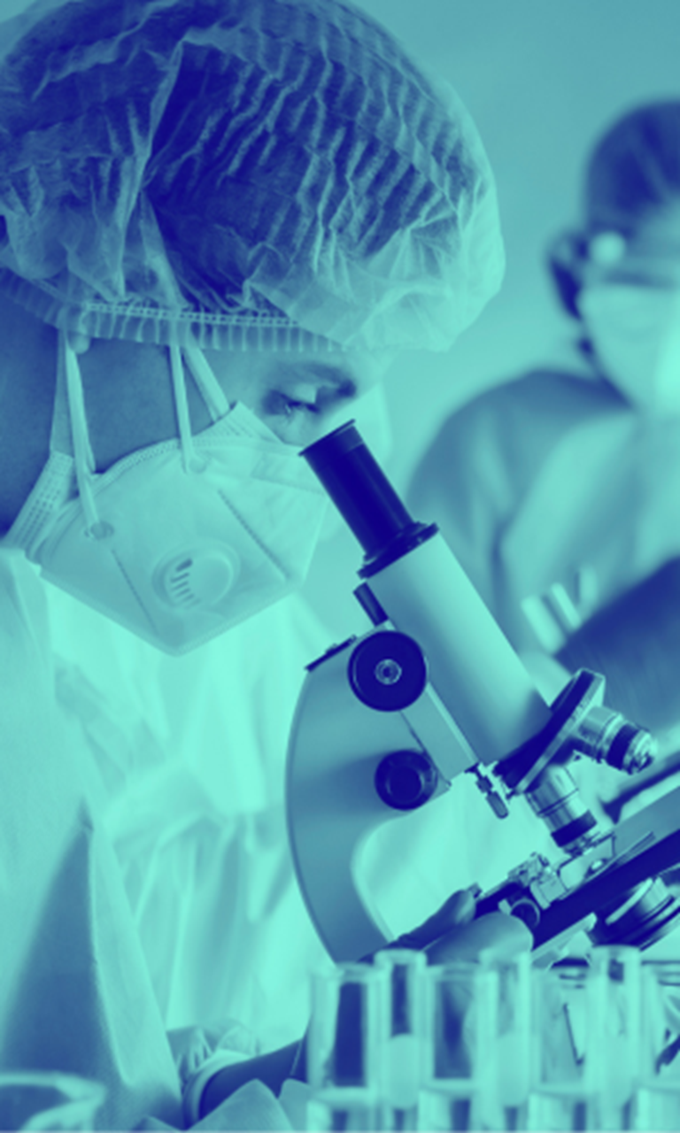 Scientist looking into scope