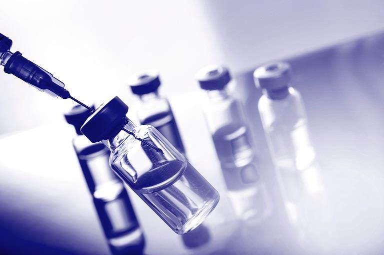Vaccination vaccine vial dose flu shot drug needle syringe