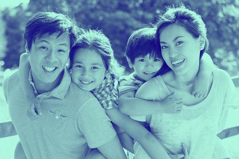 Family Enjoying Walk In Summer